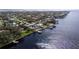 Beautiful aerial shot showcasing waterfront properties with private boat docks and serene water views at 306 Blanca Ln, Tampa, FL 33606