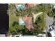 Aerial view of beautiful tile roof home with spacious lot, backyard pool and waterfront access at 306 Blanca Ln, Tampa, FL 33606