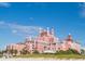 Stunning beachfront hotel with unique architecture and a picturesque view of the blue sky at 3302 E Maritana Dr, St Pete Beach, FL 33706