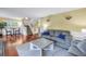 Inviting living room featuring stairs to the upper level and comfortable seating at 3302 E Maritana Dr, St Pete Beach, FL 33706