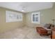 Spacious office with tiled floors and window with shutters at 3302 E Maritana Dr, St Pete Beach, FL 33706
