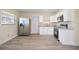 Updated kitchen features stainless steel appliances and granite countertops at 3305 W Kathleen St, Tampa, FL 33607
