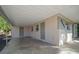 Covered carport with additional storage space and exterior access at 3305 W Kathleen St, Tampa, FL 33607