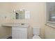 Clean bathroom with white vanity and updated fixtures at 3305 W Kathleen St, Tampa, FL 33607