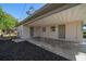 Covered carport with access to storage and the home's exterior at 3305 W Kathleen St, Tampa, FL 33607