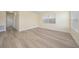 Spacious bedroom with wood-look floors and lots of natural light at 3305 W Kathleen St, Tampa, FL 33607