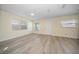 Bright and spacious living room with wood-look flooring at 3305 W Kathleen St, Tampa, FL 33607