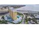 Aerial view of a luxury high-rise building with waterfront access and city views at 345 Bayshore Blvd # 610, Tampa, FL 33606