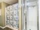 Neutral bathroom featuring shower with curtains, and a sleek glass-enclosed shower stall at 345 Bayshore Blvd # 610, Tampa, FL 33606