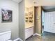 Bathroom featuring a vanity with shelving and a peek into the adjacent room at 345 Bayshore Blvd # 610, Tampa, FL 33606