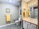 Clean bathroom with a toilet, sink, shower, and neutral color scheme at 345 Bayshore Blvd # 610, Tampa, FL 33606