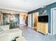 Open living area with tile floors, a sectional sofa, and a dining table at 345 Bayshore Blvd # 610, Tampa, FL 33606