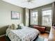 Charming bedroom with a queen-size bed, large windows, and hardwood floors at 345 Bayshore Blvd # 610, Tampa, FL 33606