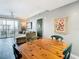 Round wooden dining table with four chairs in the dining area at 345 Bayshore Blvd # 610, Tampa, FL 33606
