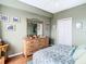 Bright bedroom with a queen bed, dresser, and city views at 345 Bayshore Blvd # 610, Tampa, FL 33606