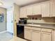 Well-equipped kitchen with light wood cabinets and modern appliances at 345 Bayshore Blvd # 610, Tampa, FL 33606