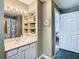 Well-appointed bathroom with a vanity, shower, and built-in shelving at 345 Bayshore Blvd # 610, Tampa, FL 33606