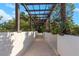 Covered walkway with pergola and lush landscaping at 345 Bayshore Blvd # 610, Tampa, FL 33606