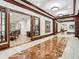 Hallway with wood-framed doors and access to a meeting room at 345 Bayshore Blvd # 610, Tampa, FL 33606