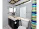 Condo bathroom with a toilet, sink, and shower at 3454 Hillmoor Dr, Palm Harbor, FL 34685