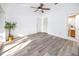 Spacious bedroom with vinyl plank flooring and ample closet space at 3454 Hillmoor Dr, Palm Harbor, FL 34685