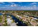 Aerial view highlighting the property's waterfront location within a residential neighborhood at 4086 13Th Ne Ln, St Petersburg, FL 33703