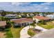 Charming single-story home features lush landscaping and a spacious driveway, nestled in a waterfront community at 4086 13Th Ne Ln, St Petersburg, FL 33703