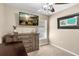 Bedroom featuring a dresser, desk, and TV for entertainment at 411 S Fremont Ave # B, Tampa, FL 33606
