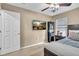 Bedroom featuring carpet flooring, a ceiling fan, and a comfortable bed at 411 S Fremont Ave # B, Tampa, FL 33606