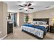Cozy bedroom with a comfortable bed, ceiling fan, and natural light offers a relaxing retreat at 411 S Fremont Ave # B, Tampa, FL 33606