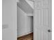 Hallway with neutral paint and flooring leading to other rooms at 411 S Fremont Ave # B, Tampa, FL 33606