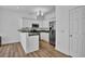 Modern kitchen featuring white cabinets and stainless steel appliances at 411 S Fremont Ave # B, Tampa, FL 33606