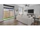 Living room featuring sliding doors to the backyard at 411 S Fremont Ave # B, Tampa, FL 33606
