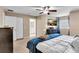 Bright main bedroom featuring a ceiling fan, and a serene bathroom en suite at 411 S Fremont Ave # B, Tampa, FL 33606
