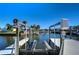 Convenient boat lift for easy water access at 4253 Rudder Way, New Port Richey, FL 34652