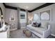 Bedroom with daybed and large window at 4259 Goldfoil Rd, Spring Hill, FL 34609