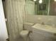Clean bathroom with shower/tub combo, toilet, and vanity at 6000 20Th N St # 129, St Petersburg, FL 33714