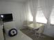 Small dining area with table and chairs at 6000 20Th N St # 129, St Petersburg, FL 33714