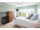 Bedroom with water views and built-in dresser at 7530 Sunshine Skyway S Ln # 116, St Petersburg, FL 33711