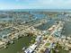 Property's aerial view, highlighting its waterfront location and neighborhood at 7872 1St S Ave, St Petersburg, FL 33707