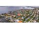 Aerial view showcasing a home's waterfront location and neighborhood at 807 2Nd S Ave, Tierra Verde, FL 33715