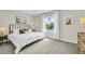 Comfortable bedroom with a large bed and plenty of natural light at 1574 Hammer Pl, Largo, FL 33774