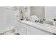 Bathroom with double vanity and a large shower at 1574 Hammer Pl, Largo, FL 33774