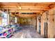 View inside workshop, showing wooden beams and storage at 33137 Cercelia Rd, Dade City, FL 33523