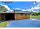 Spacious workshop with various tools and storage at 33137 Cercelia Rd, Dade City, FL 33523