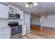 Updated kitchen with white cabinets and stainless steel appliances at 33137 Cercelia Rd, Dade City, FL 33523