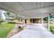 Covered carport and walkway leading to house entrance at 33137 Cercelia Rd, Dade City, FL 33523