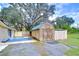 Wooden shed with metal roof in backyard setting at 33137 Cercelia Rd, Dade City, FL 33523