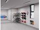 Garage with organized storage for bikes, boards, and other recreational items at 4441 Pompano Se Dr, St Petersburg, FL 33705