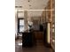 Modern kitchen with island, wine storage, and high-end appliances at 4441 Pompano Se Dr, St Petersburg, FL 33705